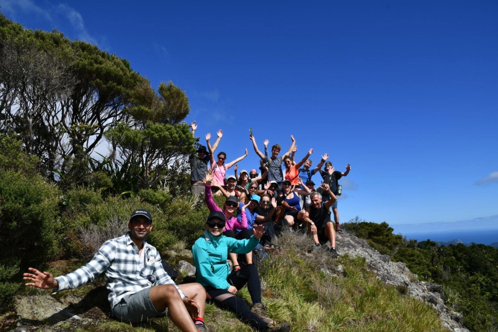 Group posing for photo on Great Barrier Island